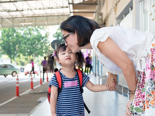 Mother Sending Child To School