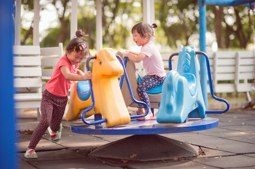 Children Playing In A Playground
