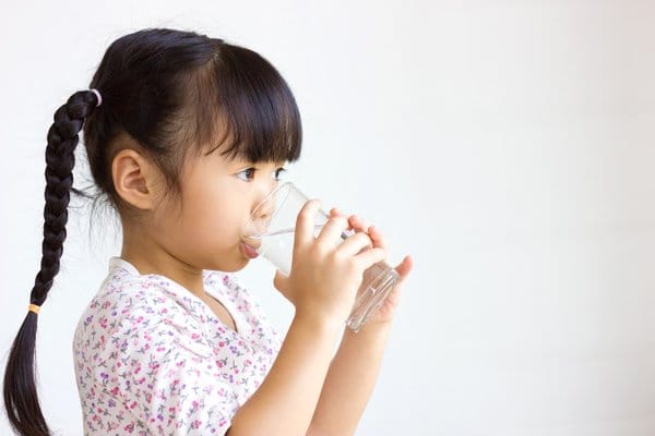 Girl Drinking a Glass of Water