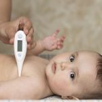 Fever And Temperature Taking With Digital Thermometer