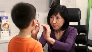 Dr Heng Siok Kheng with a patient