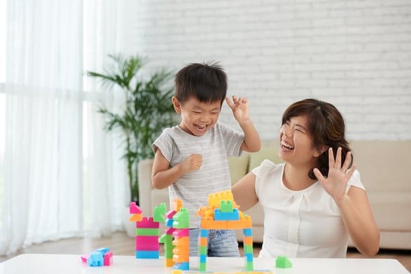 Mother and Son Playing Lego