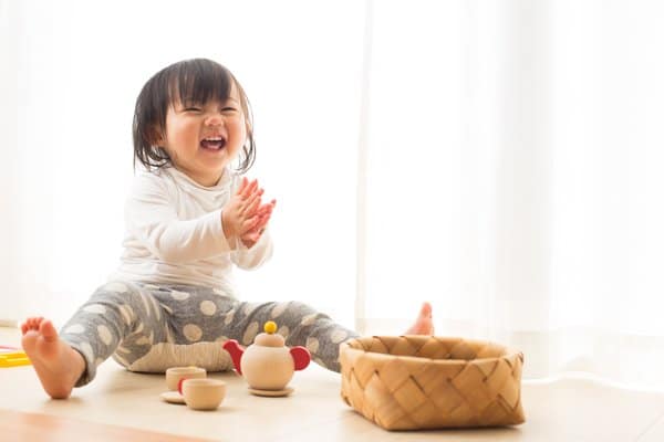 Children Playing with Tea Sets