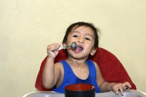 Boy Learns To Eat By Himself