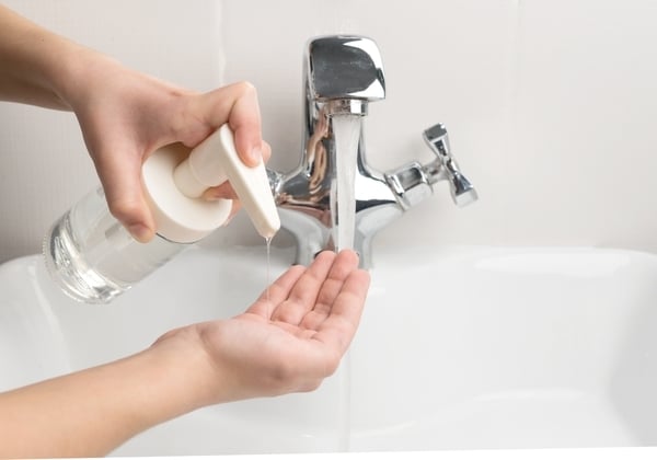 Washing Hands At The Sink