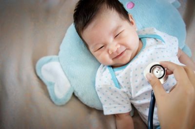 Doctor Listens To The Heartbeat Of Baby Using Stethoscope