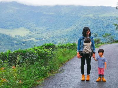 Mother Holds On To Child In Outdoor Environment